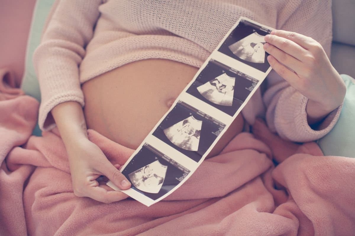 zwangerschapsaankondiging met echofoto